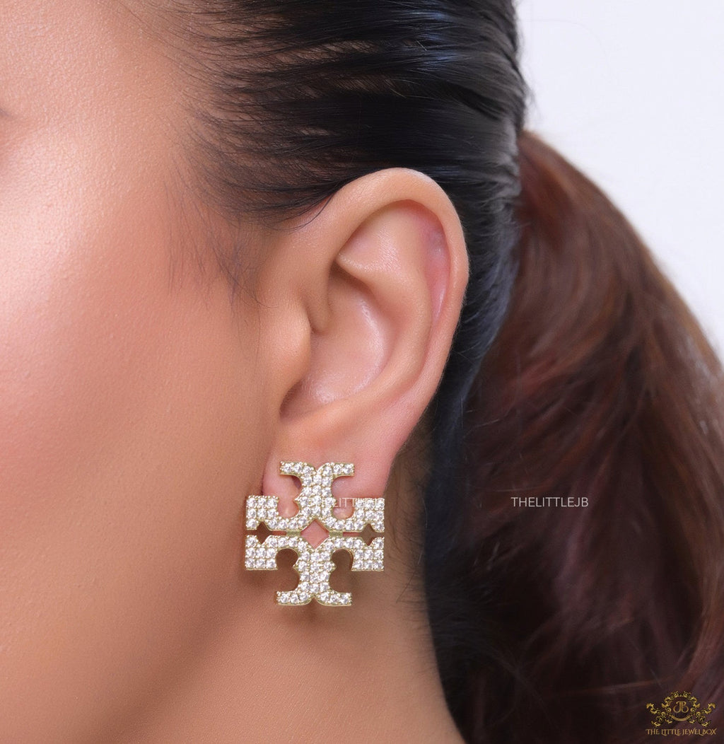 Gold plated twin T motif cz earrings