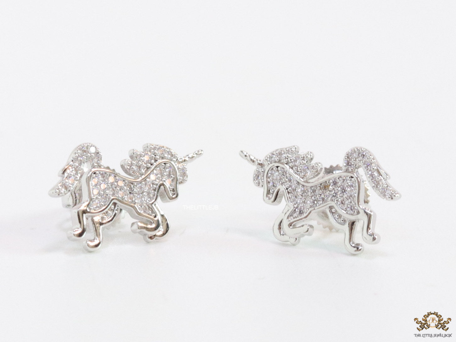 Unicorn cz stud earrings in platinum 15mm