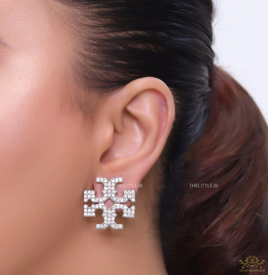 Platinum plated twin T motif cz earrings