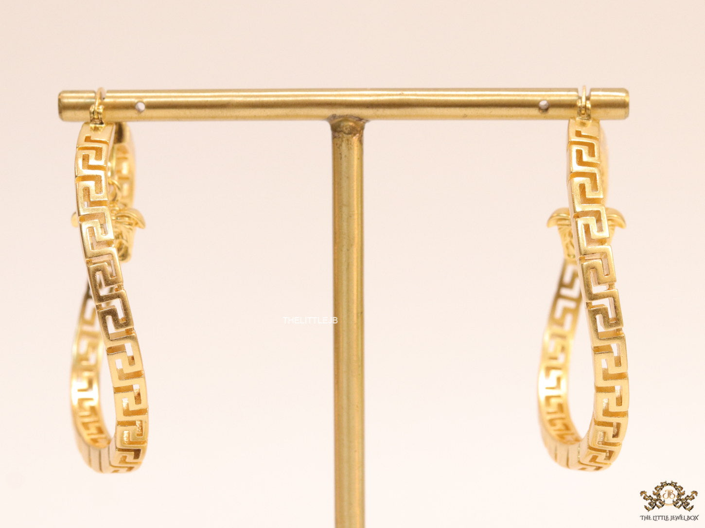 Designer golden twisted hoops 52 mm