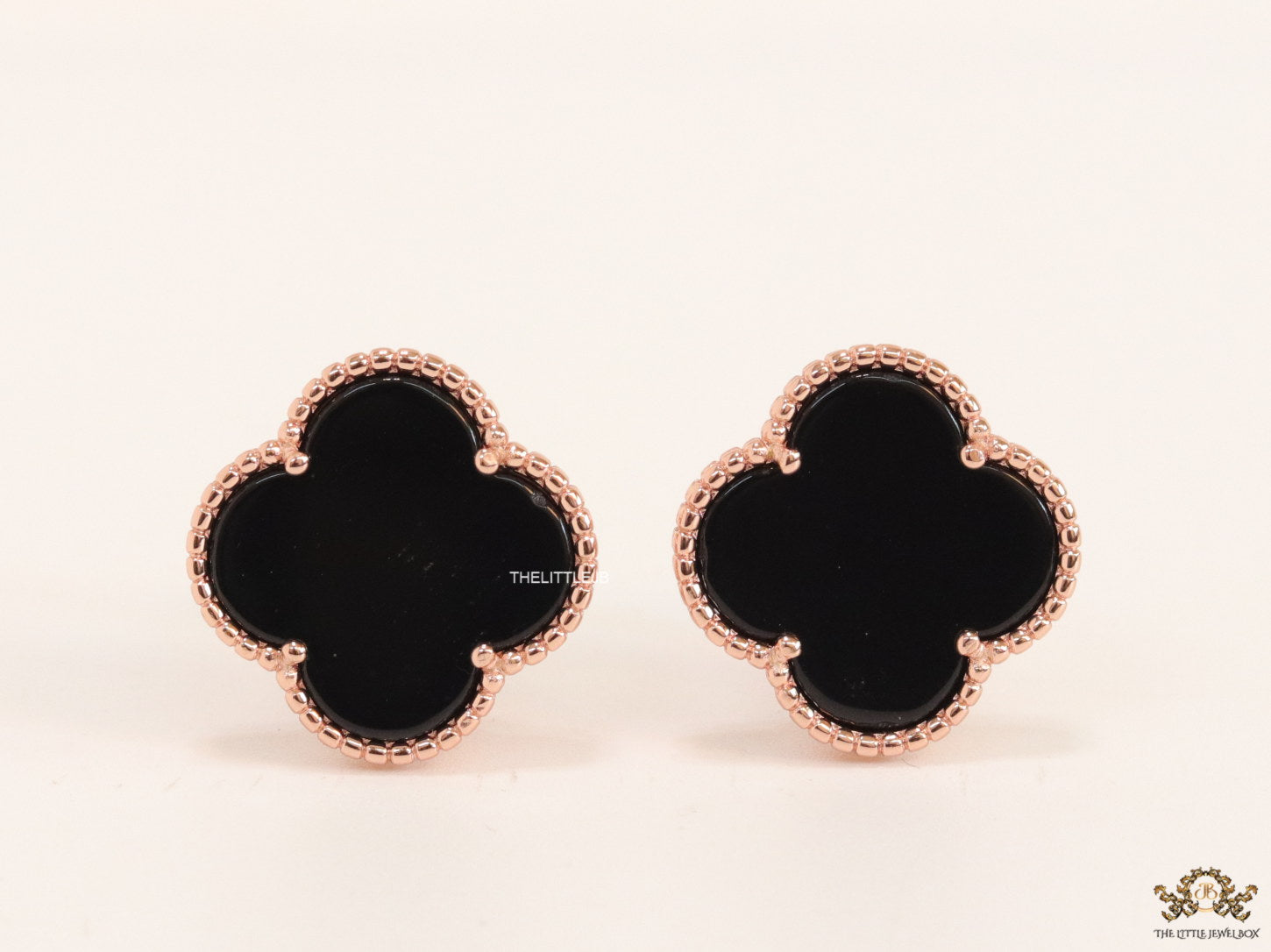 Black clover stud earrings in rose gold plating