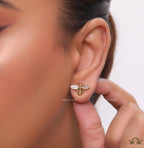 Designer pearl earrings with matte gold flying bee motifs