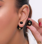 Designer pearl earrings with matte gold flying bee motifs