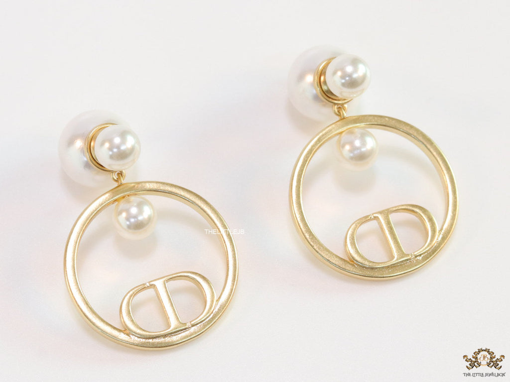 Pearl bomber earrings with golden alphabet ring drop