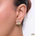 Gold plated twin C motif studs in cz baguettes