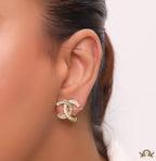 Gold plated twin C motif studs in cz and baguettes