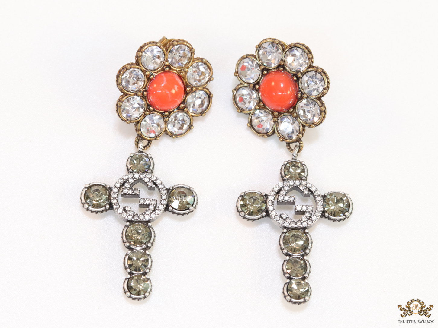 Floral cz and alphabet dangles with orange stone centre