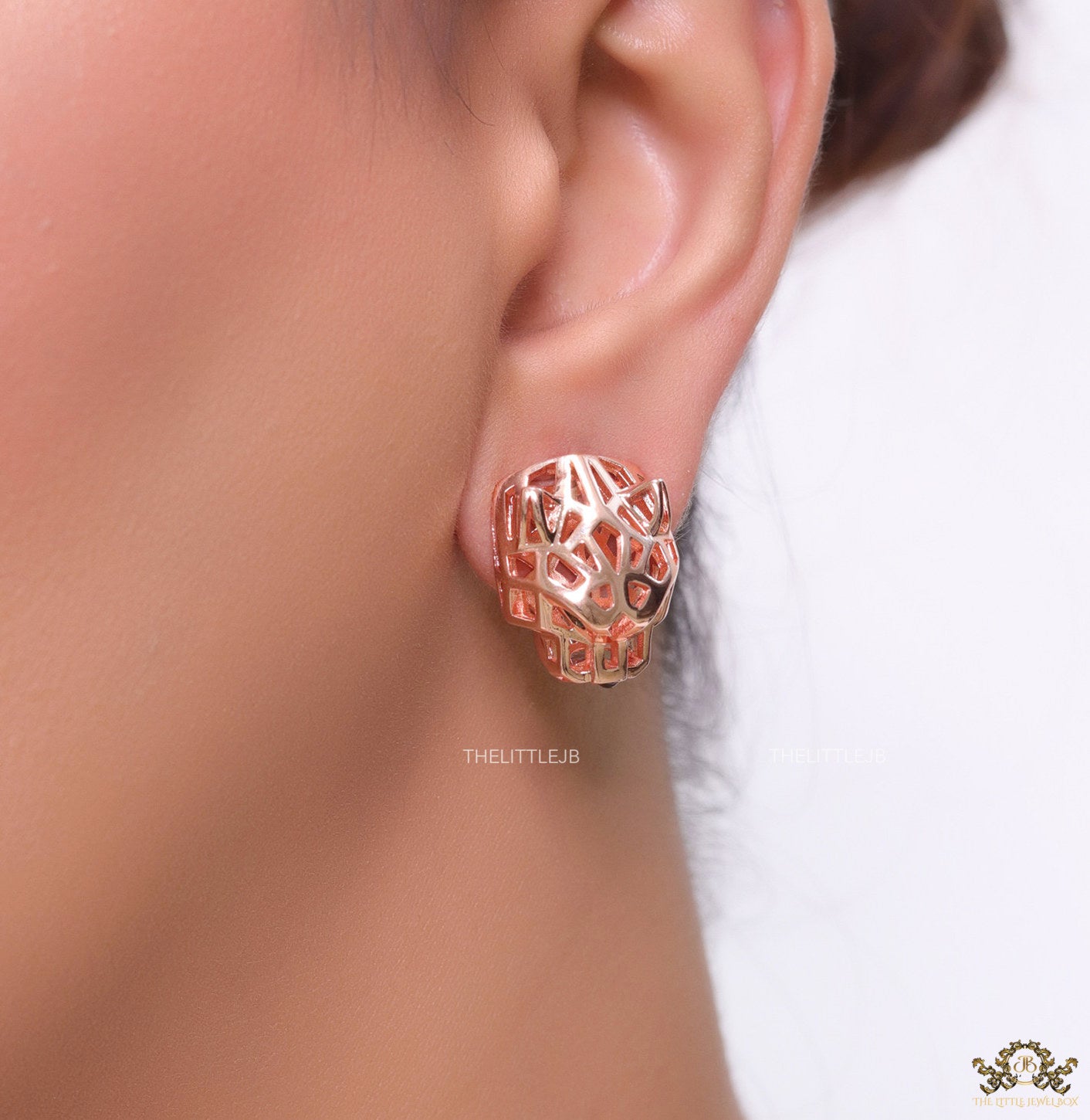 Rose gold plated panther face clip back studs in cutwork