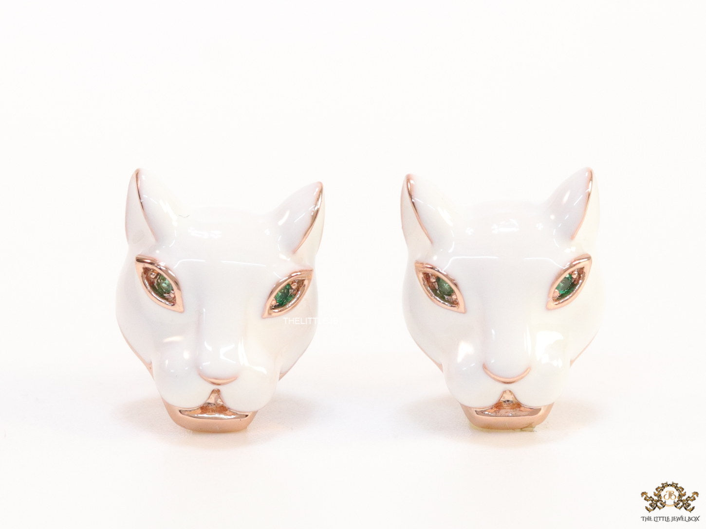 White and rose gold panther face studs