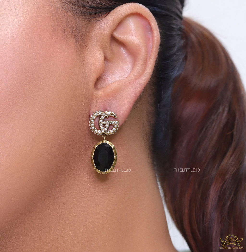 Rustic double G earings with oval black drop