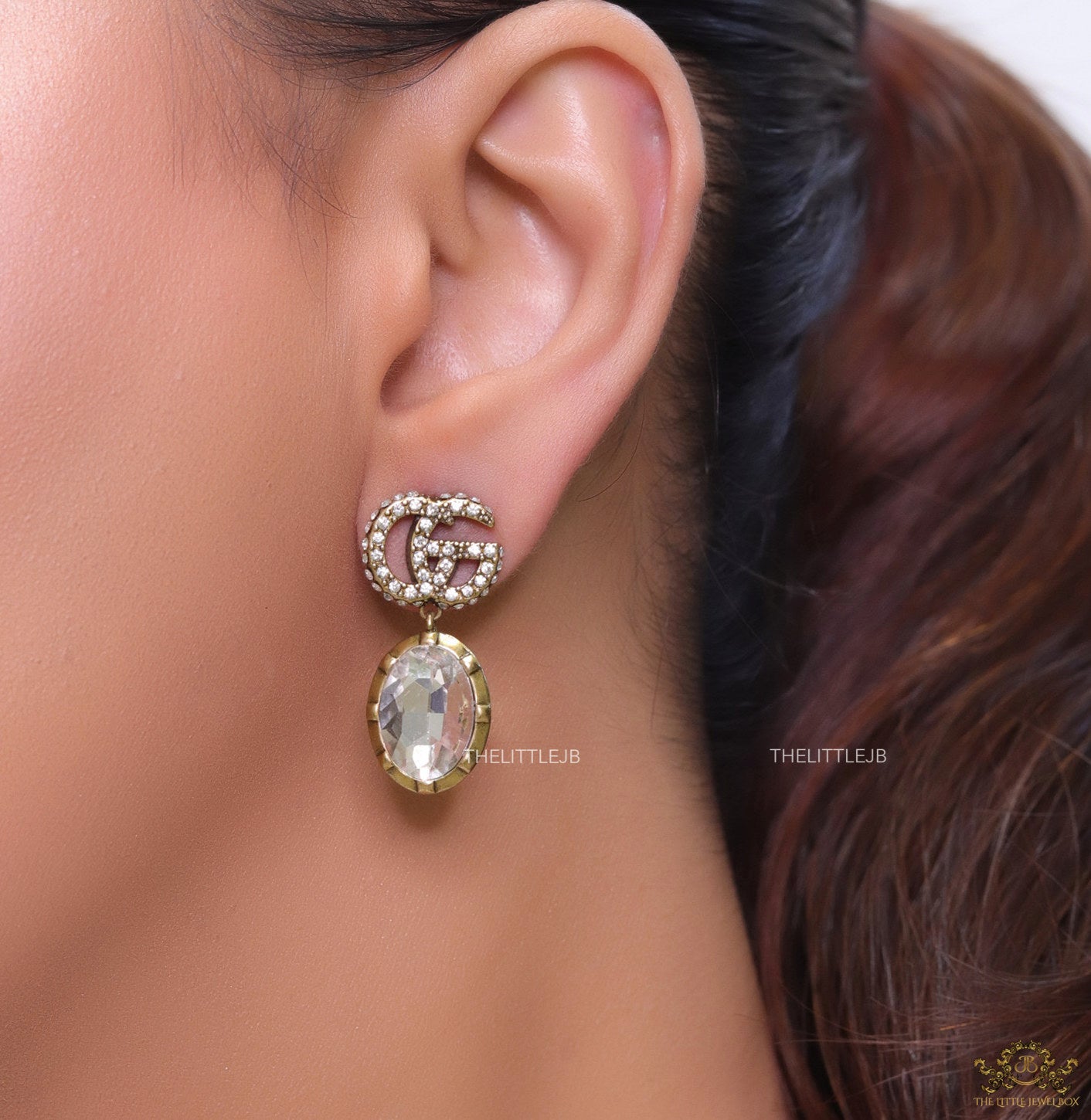 Rustic double G earrings with white drop