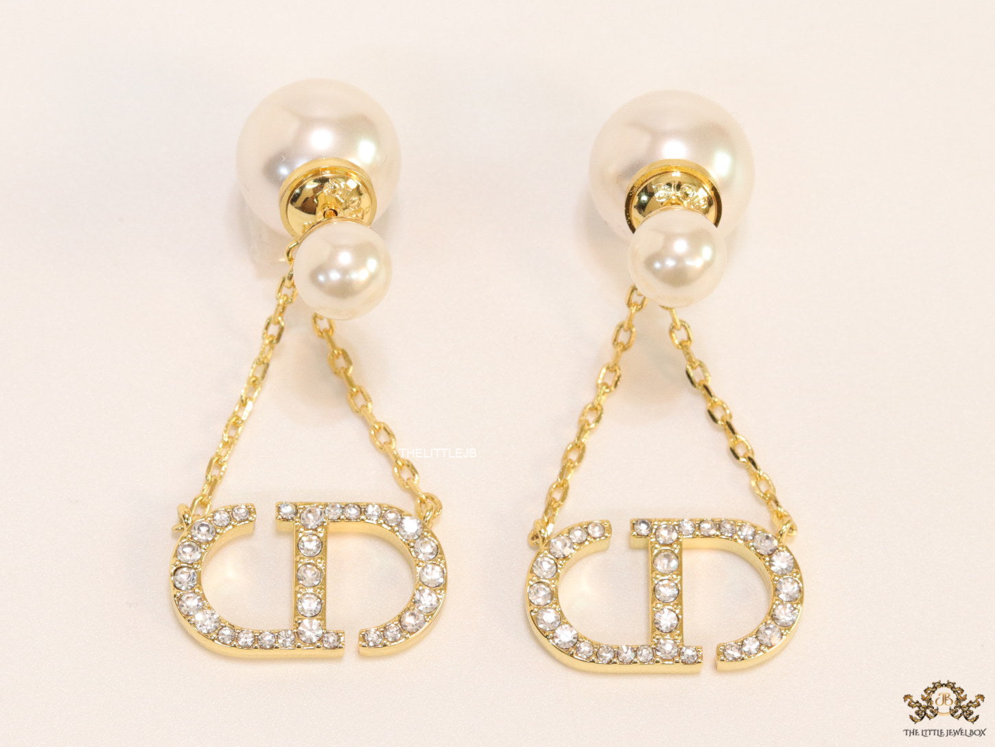 Pearl bomber earrings with cz alphabet initials in drop chains