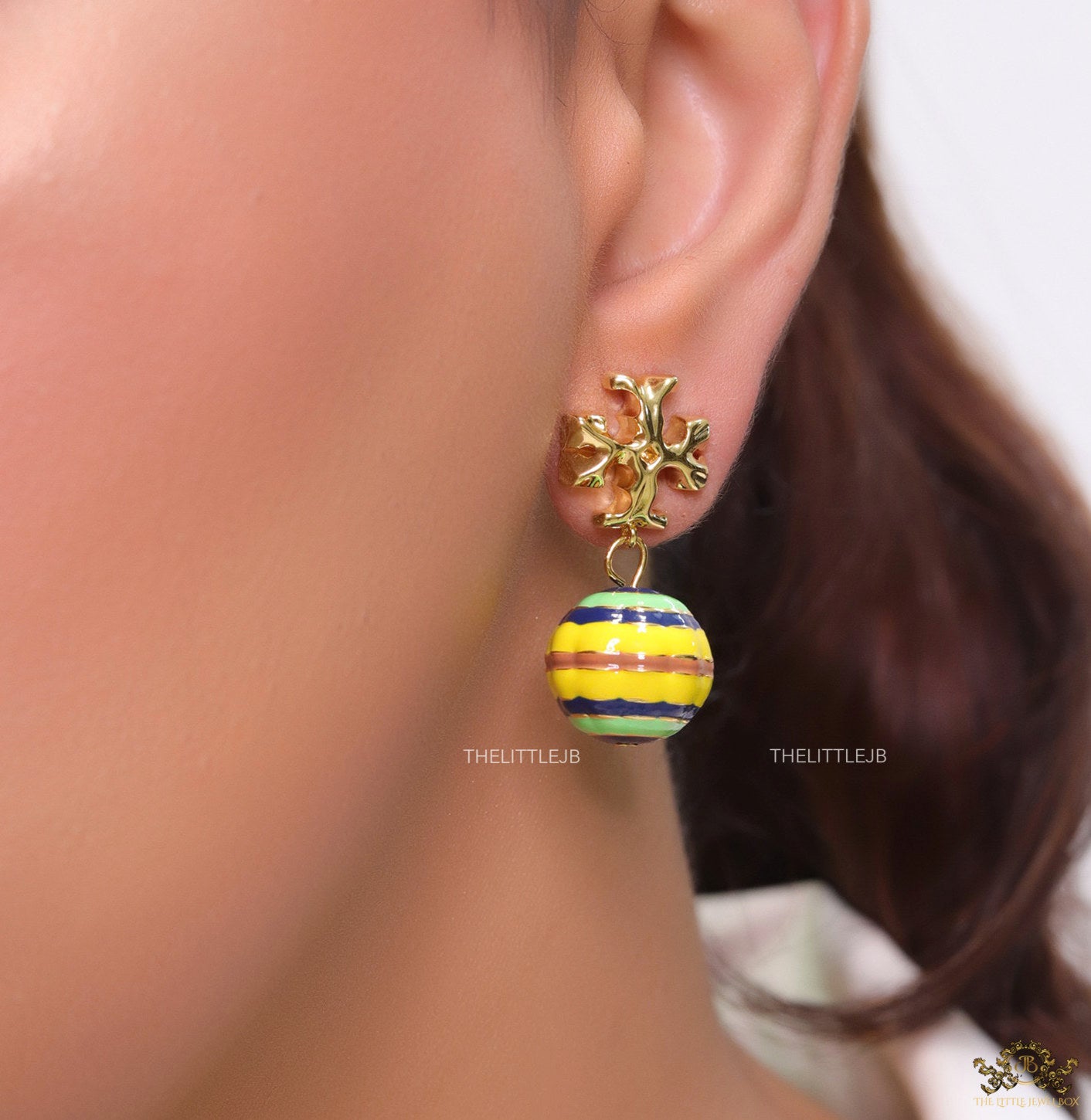 Enamel coated round drop earrings in gold plating