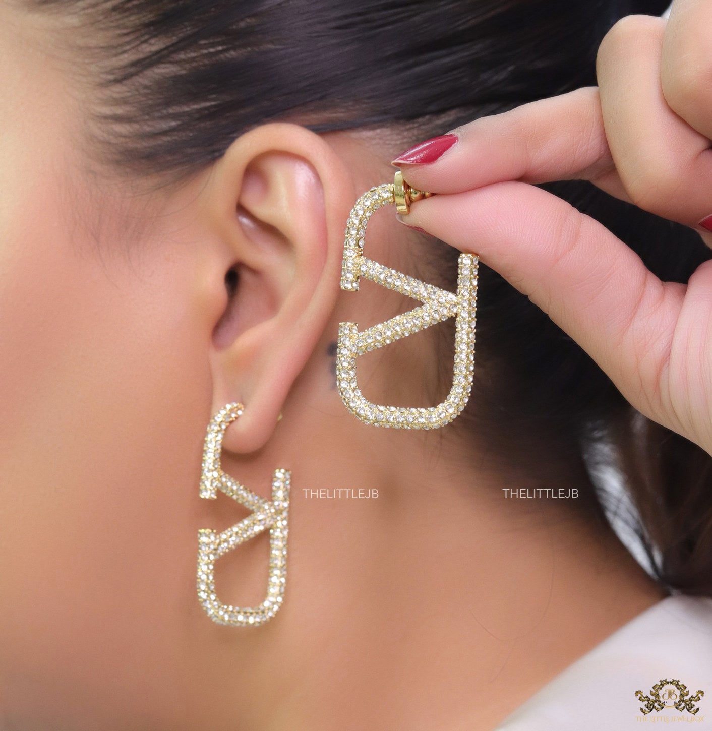 Open golden alphabet earrings with cz