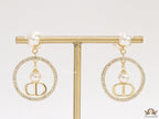 Golden cz round dangles with alphabets and pearl bomber pattern