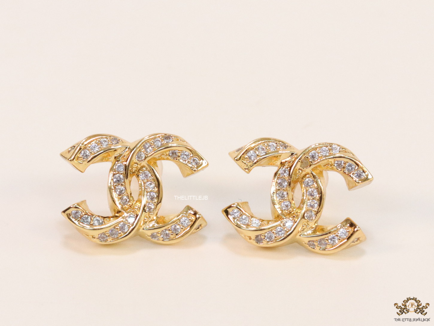 Gold plated entwined twin C motif cz studs
