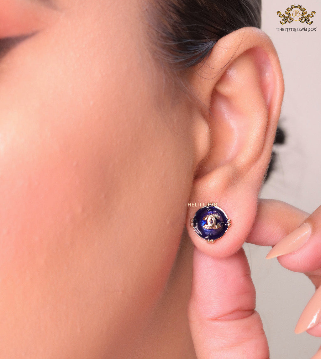 Royal blue studs with double C in centre