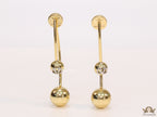 Open long twin lobed golden earrings