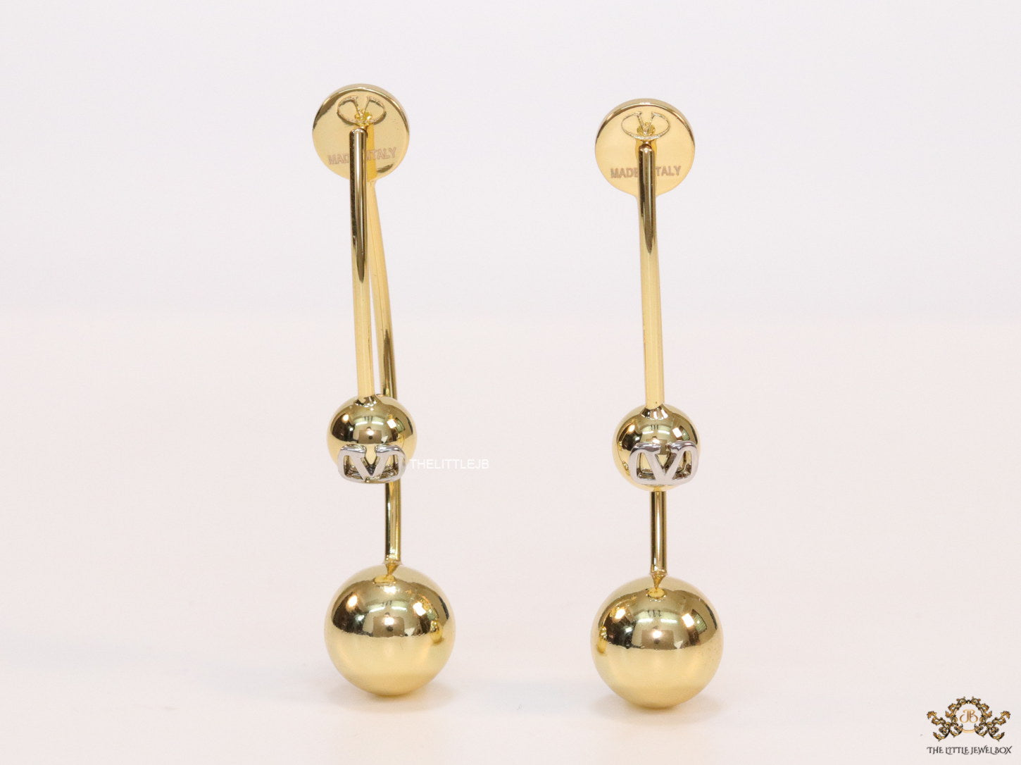 Open long twin lobed golden earrings