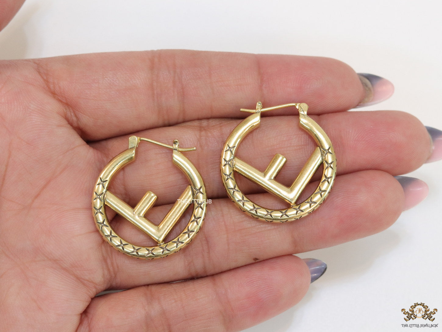 Designer golden hoops with alphabet motif