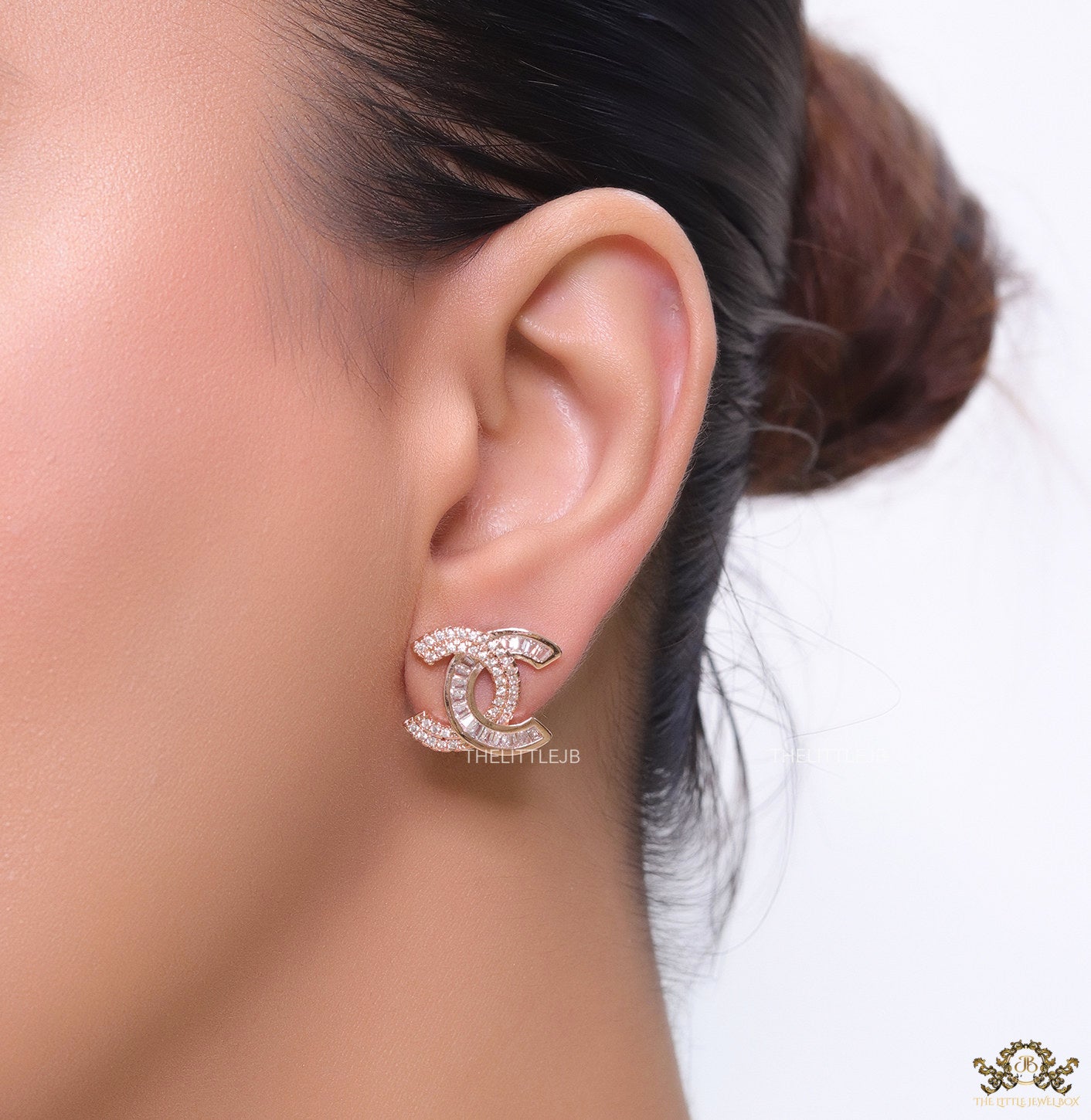 Rose gold plated twin C motif cz baguette studs