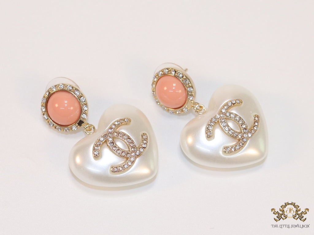 Heart shaped pearl and cz earrings with twin C motif