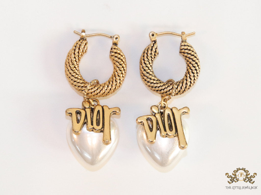 Golden hoops with alphabets and pearl drop