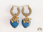 Golden hoops with alphabets and blue pearl drop