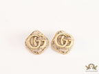Cream velvet fur studs with golden twin G motif