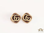 Brown velvet fur studs with golden twin G motif