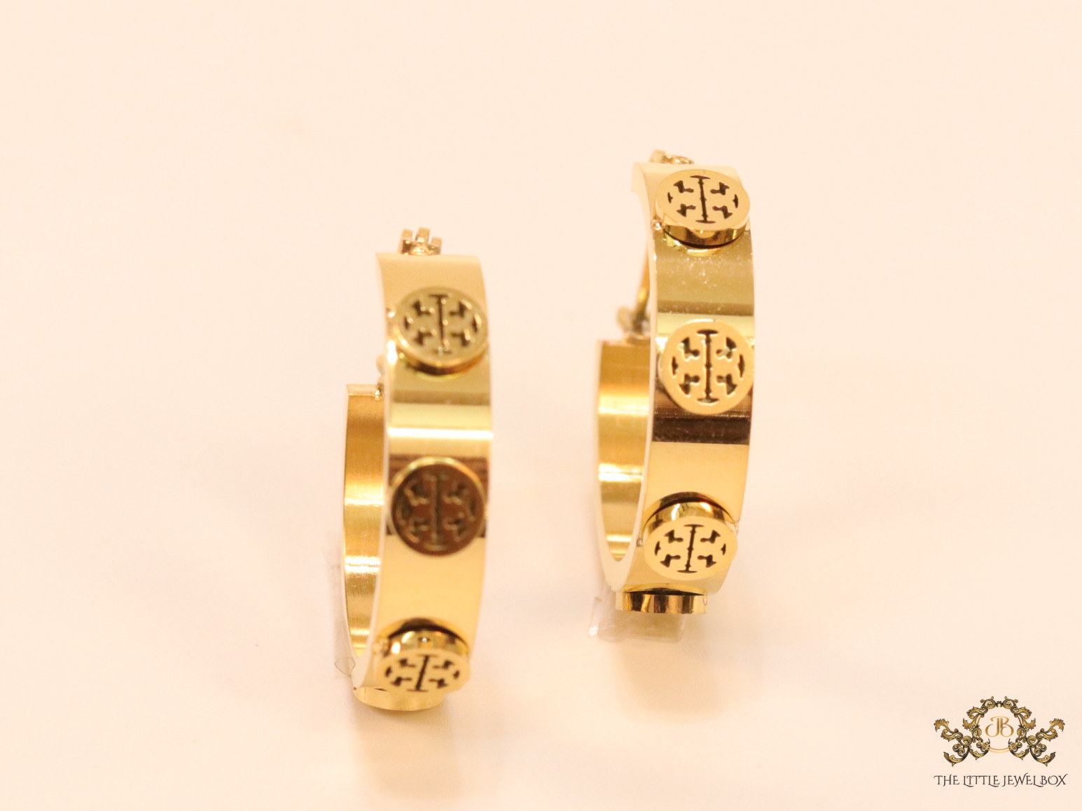 Gold plated hoop earrings with double T motifs