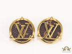Alphabet motif golden stud earrings with leather finish