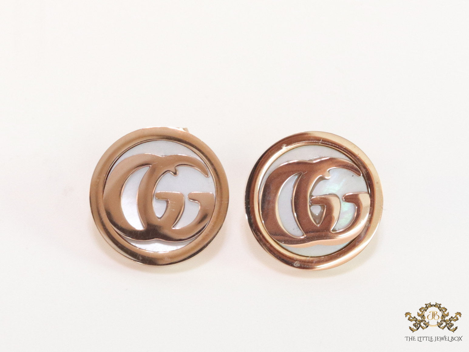 Rose gold plated twin G motif studs with MOP