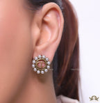 Gold plated round stud earrings with pearl lining and alphabets