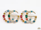 Double G golden earrings with multicolor cz stones