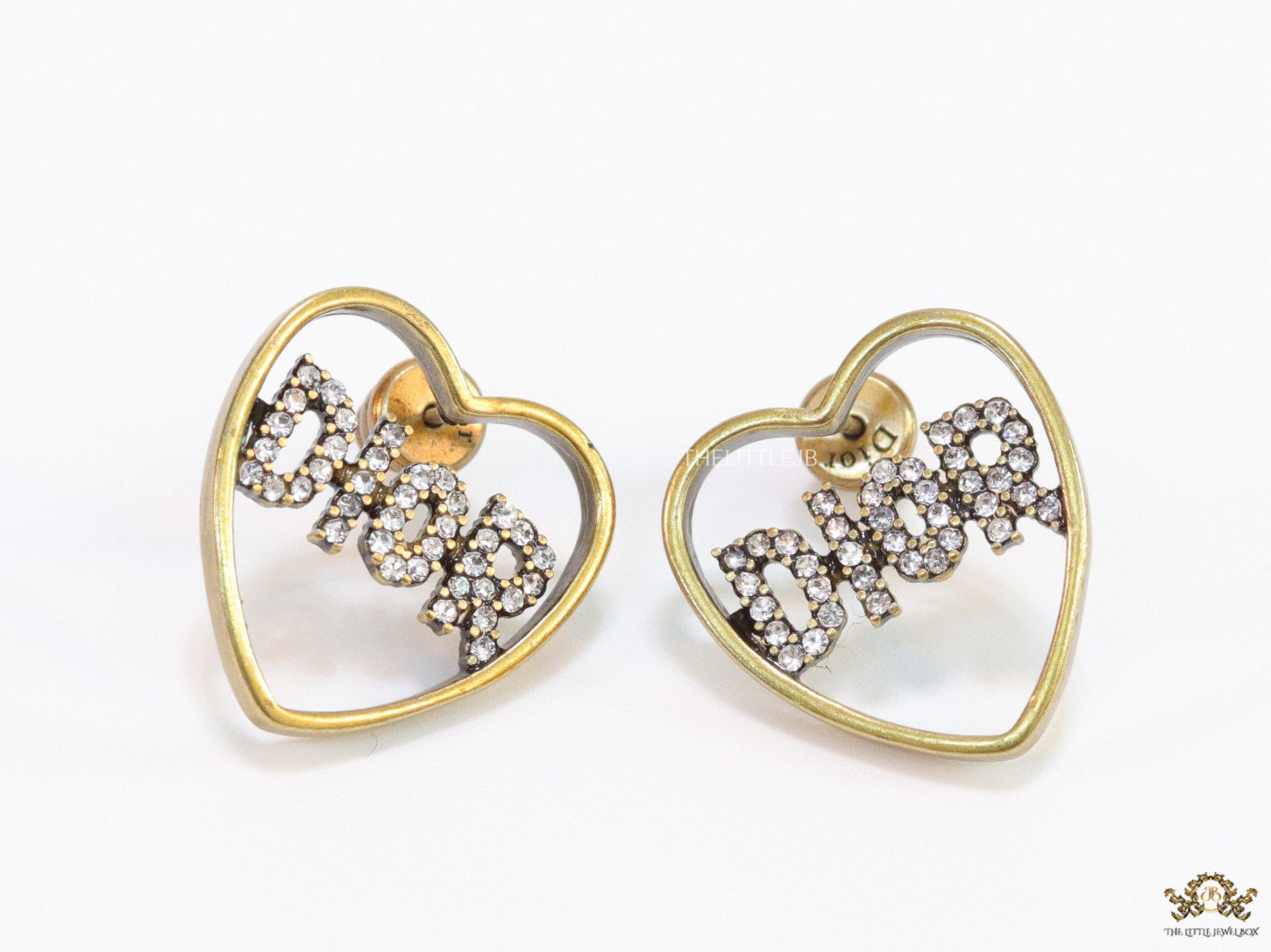 Matt gold plated heart shaped earrings with cz alphabets