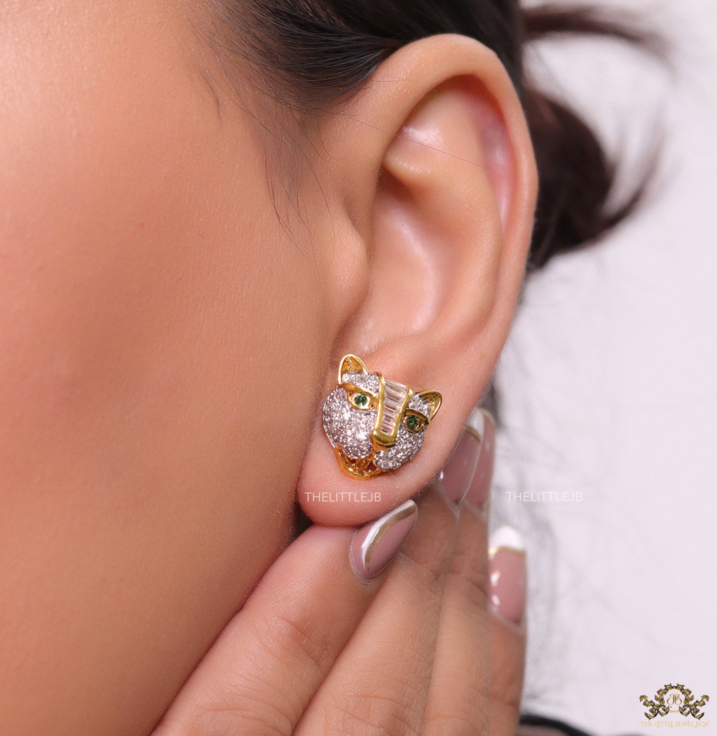 Cz panther stud earrings in gold finish and emerald green eyes