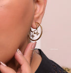 Designer golden hoops with various charms