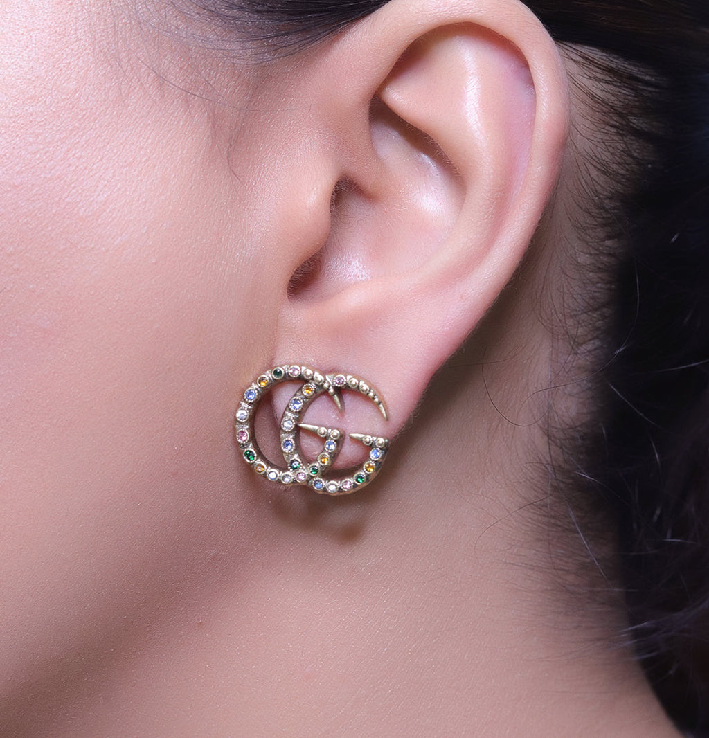 Antique gold plated twin G motif studs with multicoloured stones