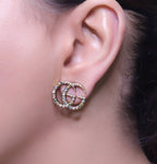 Antique gold plated twin G motif studs with multicoloured stones