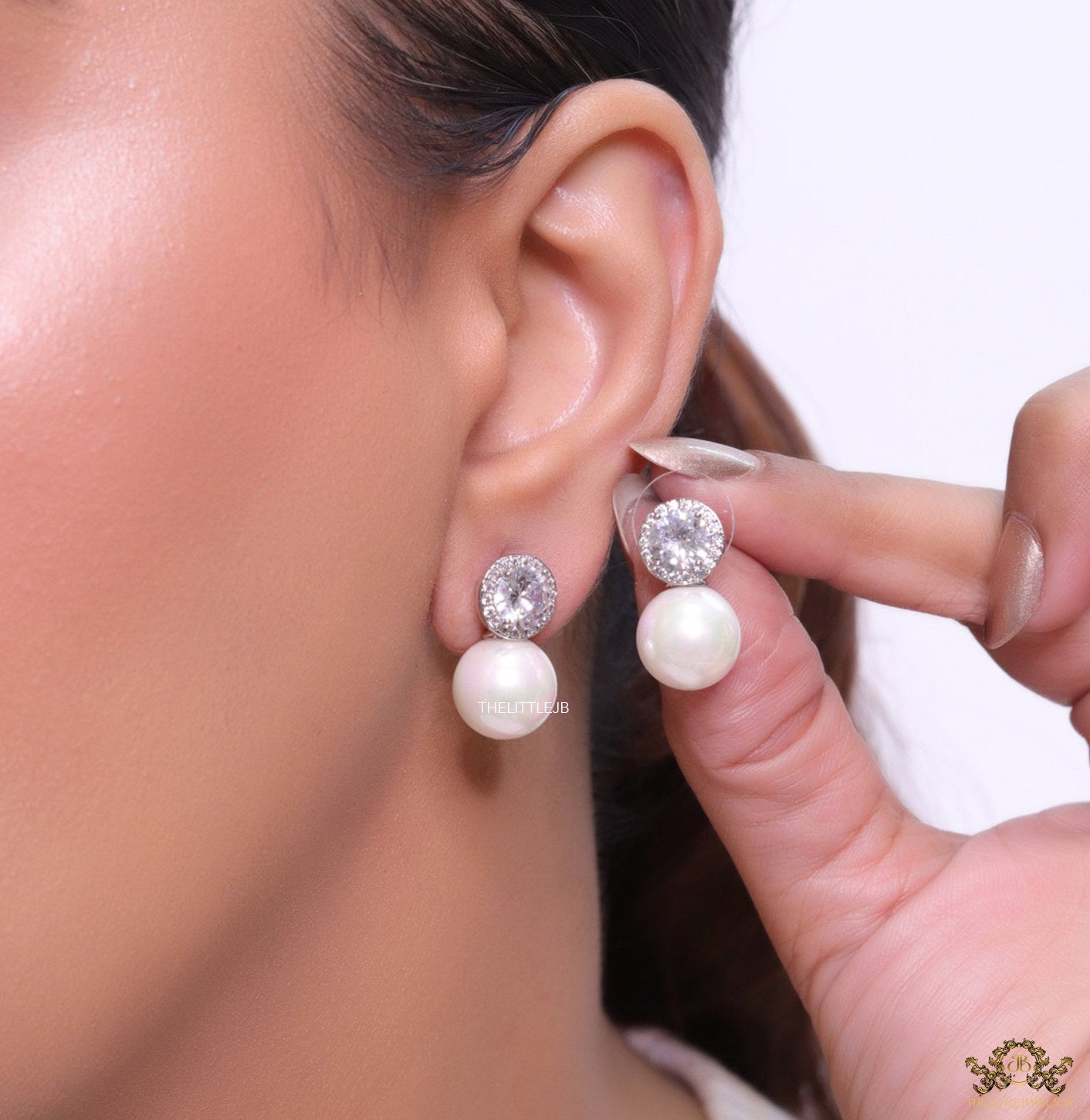 Platinum plated round cz earrings with pearl drop