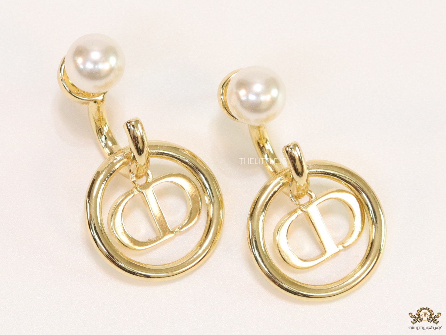 Golden alphabet earrings with pearl tops