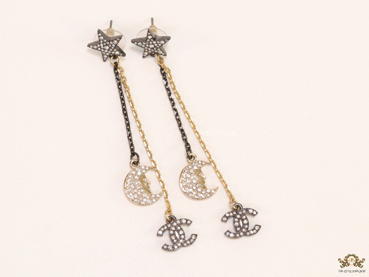 Dual chain star and moon dangles with double C motif