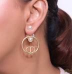 Pearl bomber earrings with golden alphabet ring drop