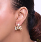 Gold plated pearl studs with cz alphabet drops
