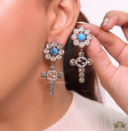 Floral cz and alphabet dangles with blue stone centre