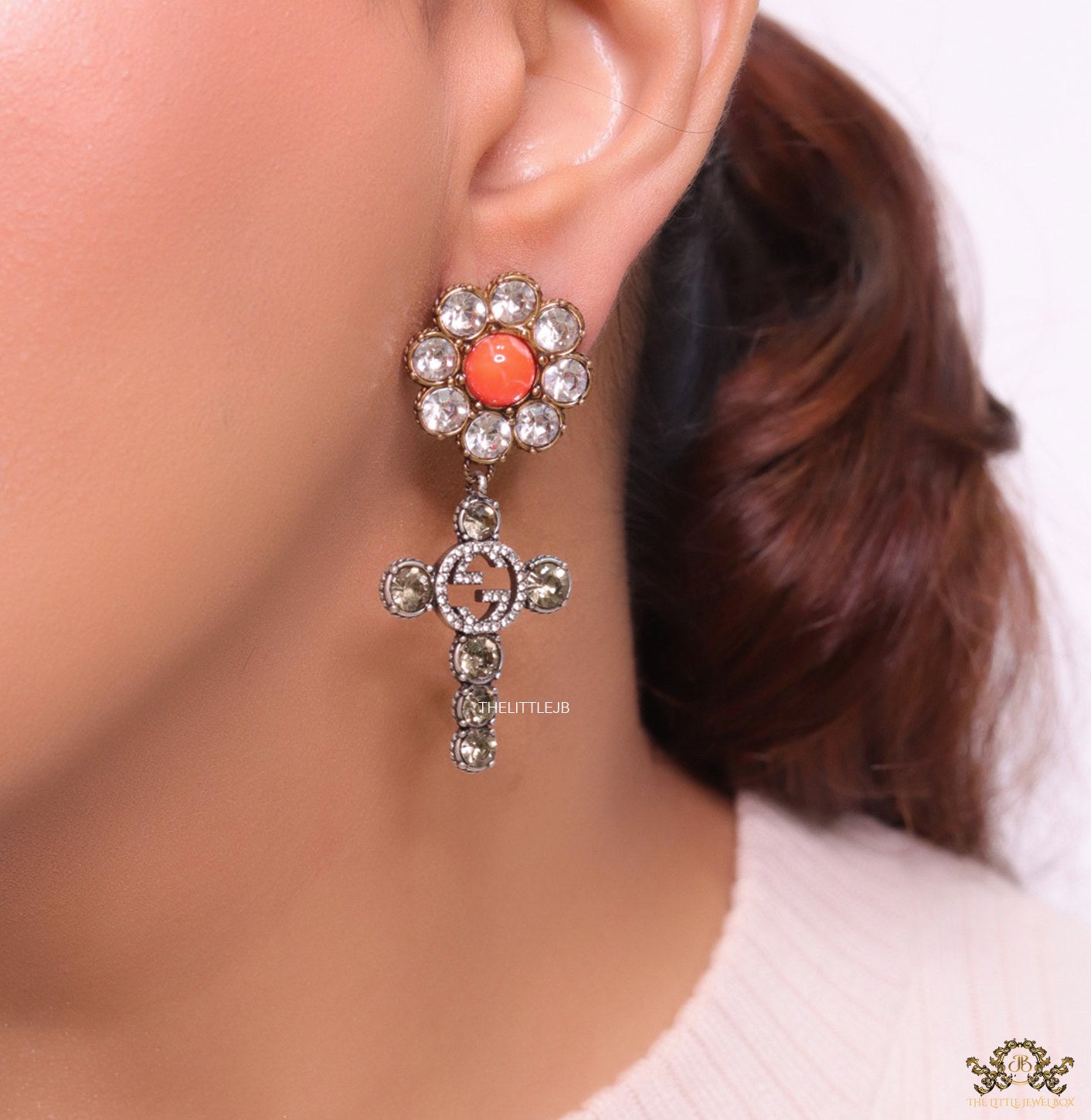 Floral cz and alphabet dangles with orange stone centre