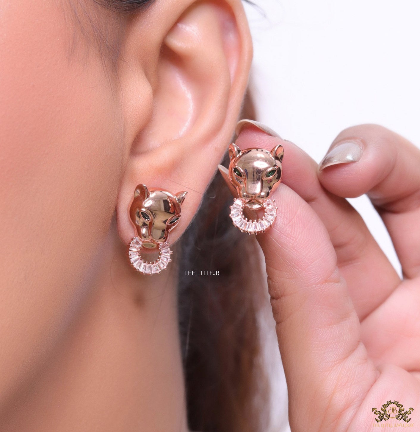 Rose gold panther face studs with cz baguette ring