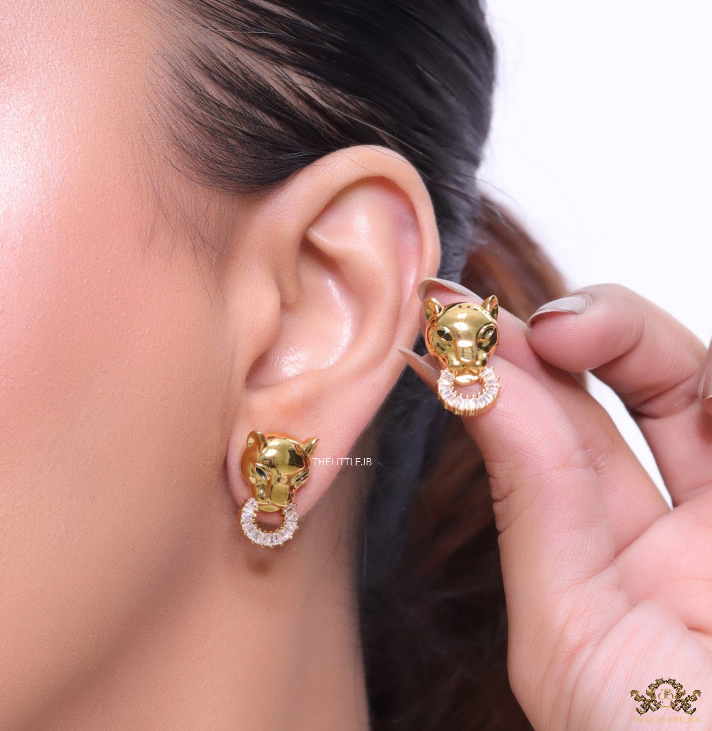 Golden panther face studs with cz baguette ring
