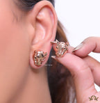 Rose gold panther face studs